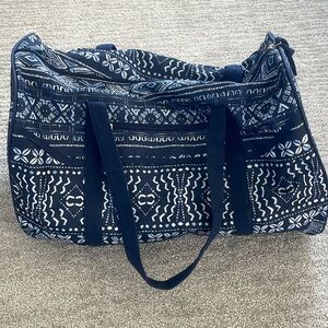 Blue and white duffel bag